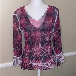 Layered boutique top. Ruffle detail